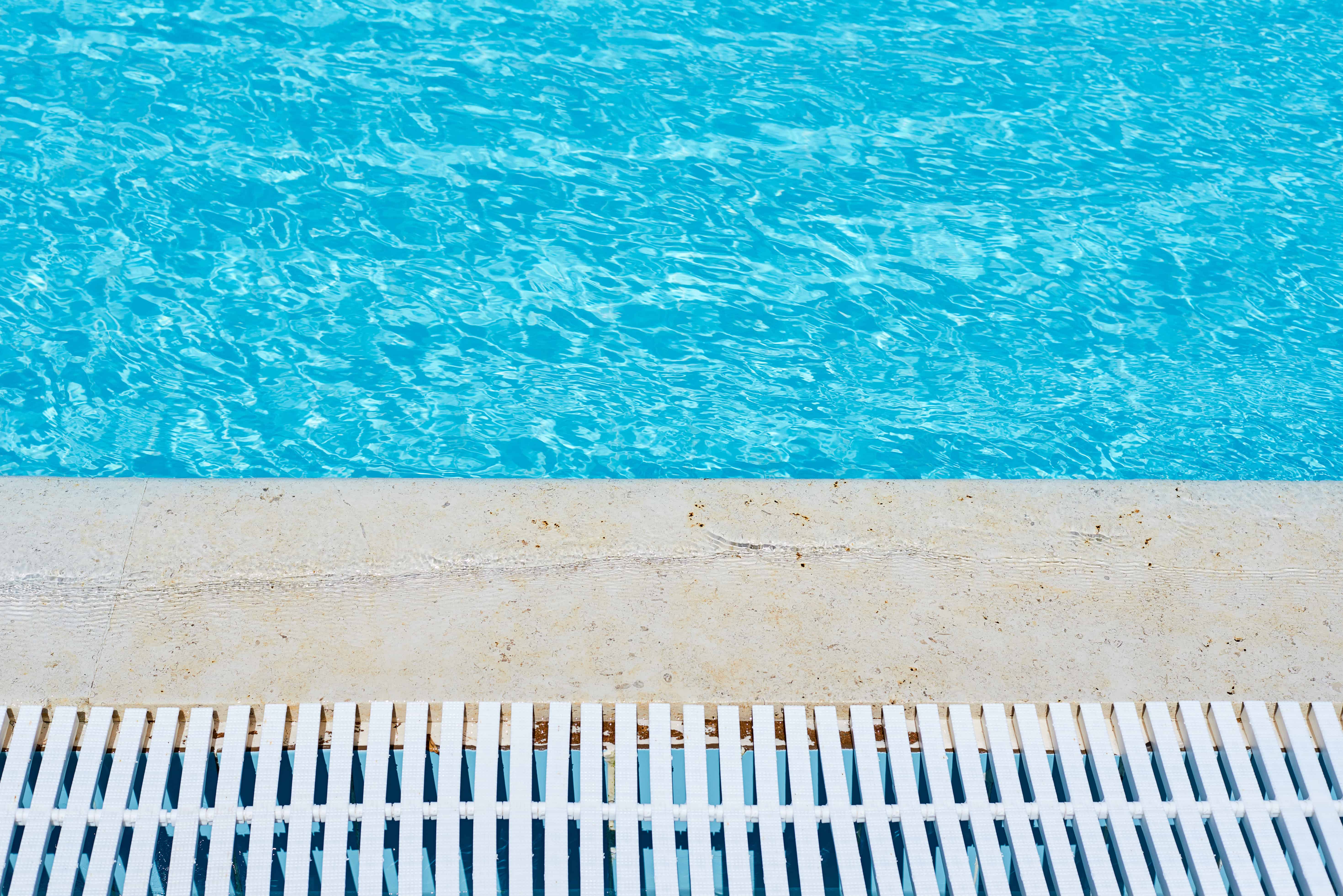 Blog hero photo for "Chlorine Pool vs Saltwater: Which One Should You Choose?" — relevant completed pool/backyard project