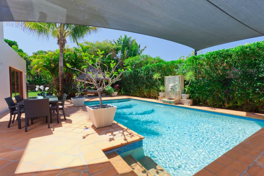 Blog hero photo for "Four Benefits of a Sloped Backyard Pool" — relevant completed pool/backyard project