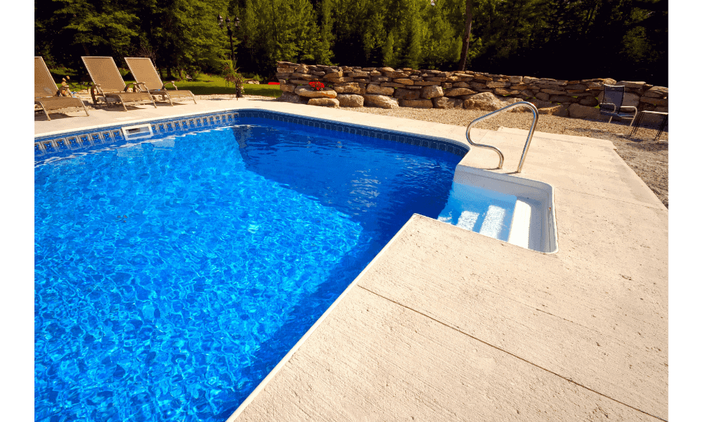 Blog hero photo for "Questions to Ask Before Hiring Custom Pool Builders" — relevant completed pool/backyard project