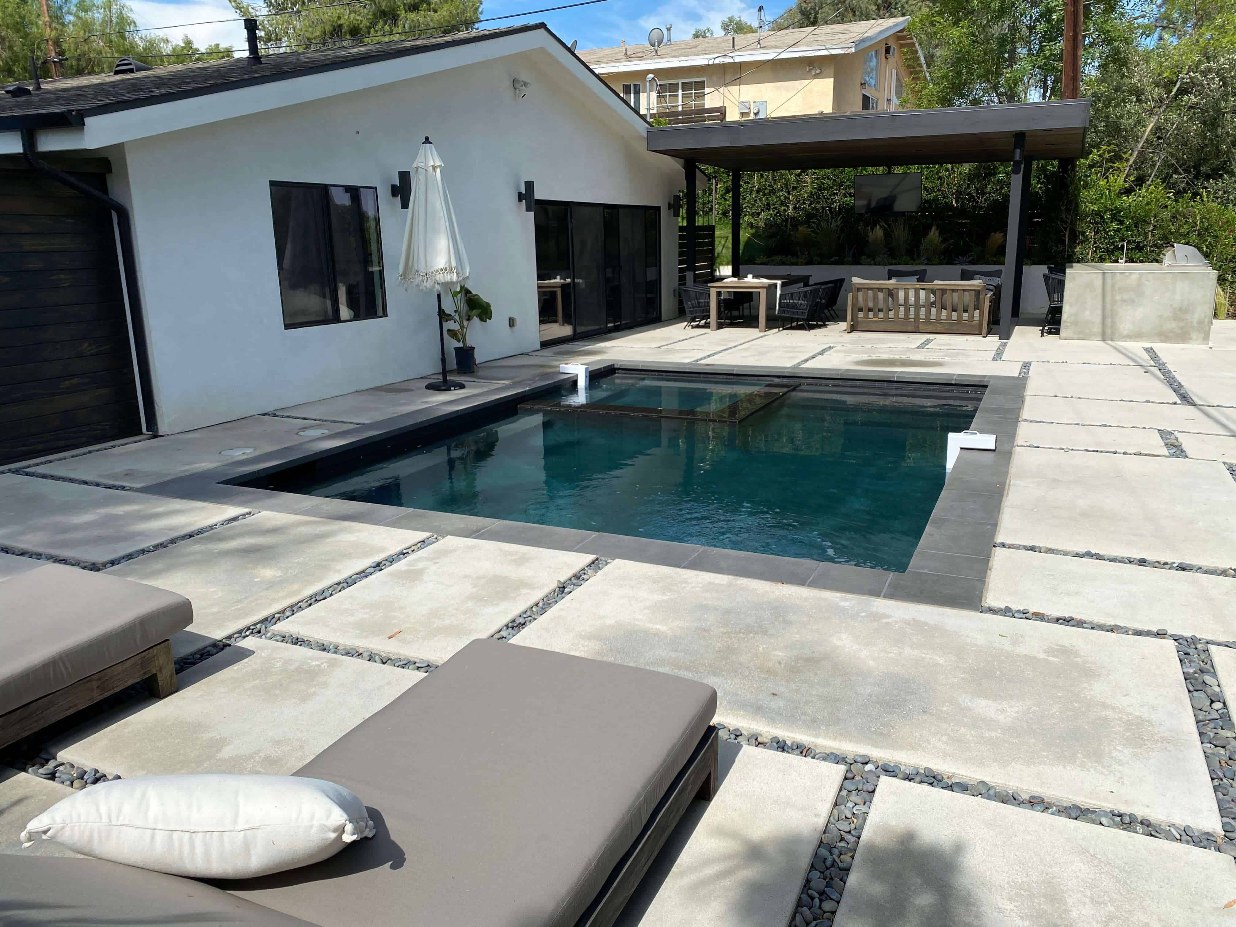 Blog hero photo for "The Benefits Of Remodeling Your Pool" — relevant completed pool/backyard project