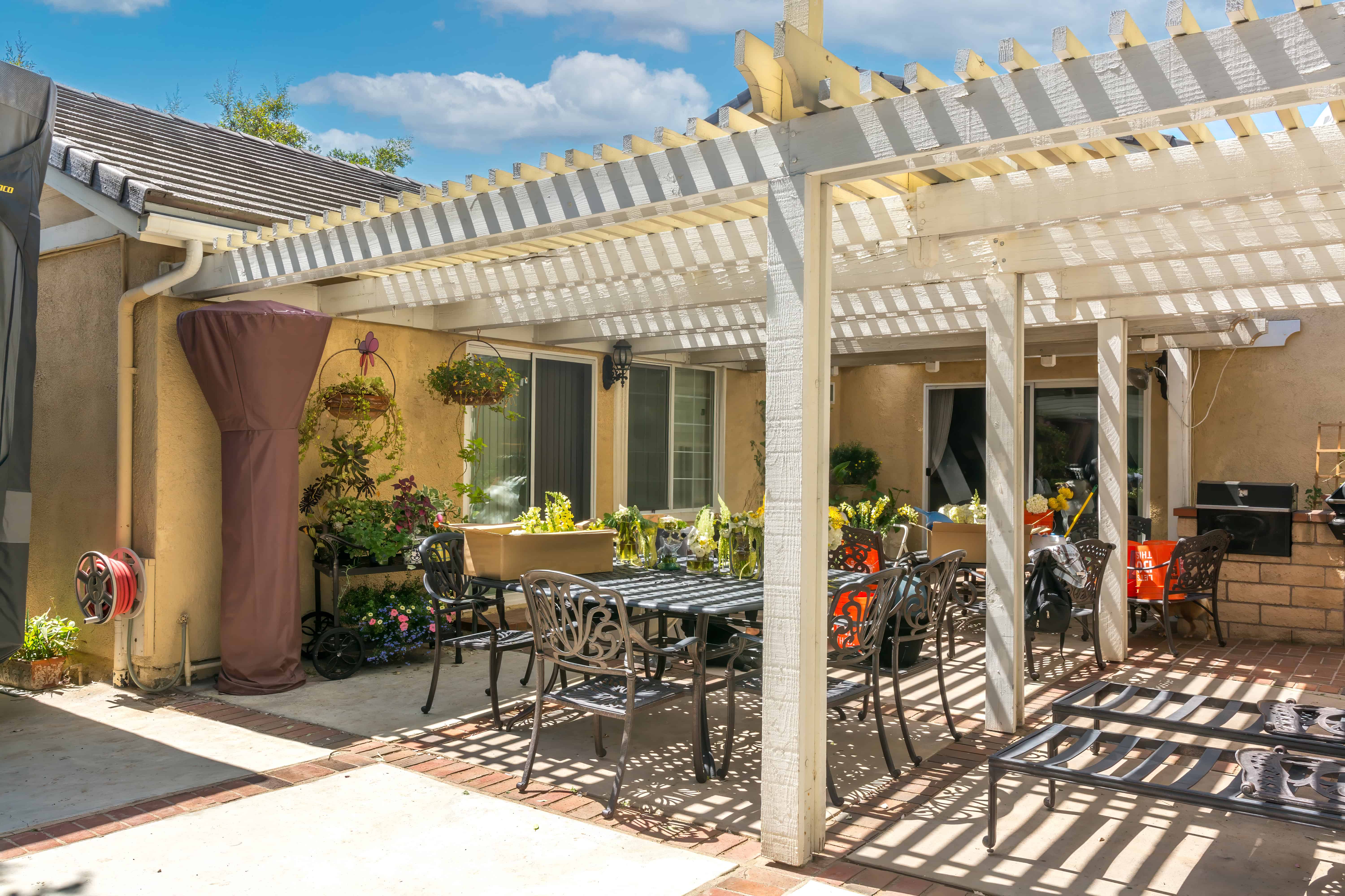Blog hero photo for "What are the Benefits of Patio Covers?" — relevant completed pool/backyard project