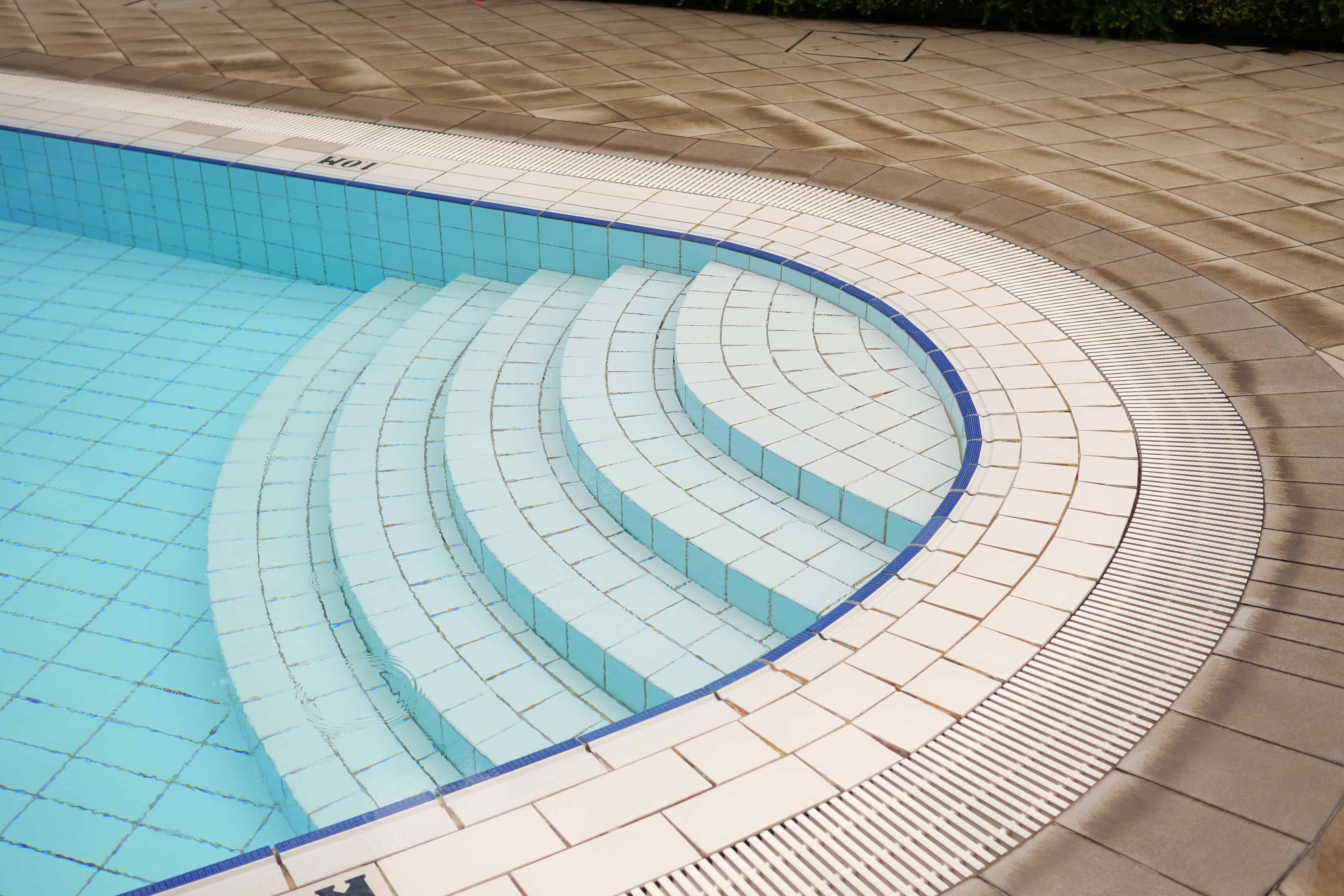 Blog hero photo for "When Do You Need to Resurface a Pool?" — relevant completed pool/backyard project